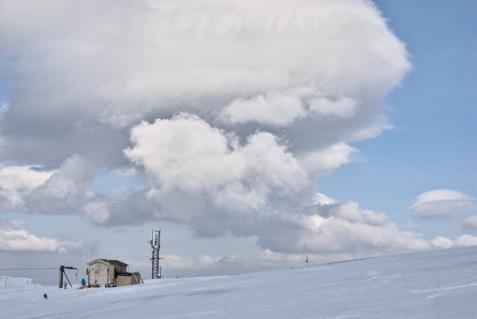 Cumulus cloud over Aonach Mòr in winter